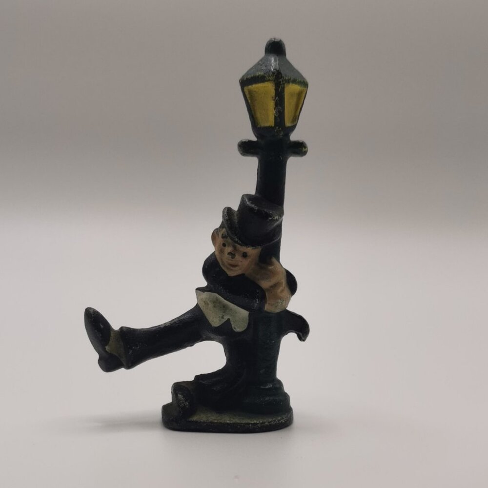 Vintage Cast Iron bottle opener, Figure, Man Holding On Lamppost, 4.25"x2"‎